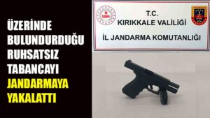 Üzerinde bulundurduğu ruhsatsız tabancayı jandarmaya yakalattı